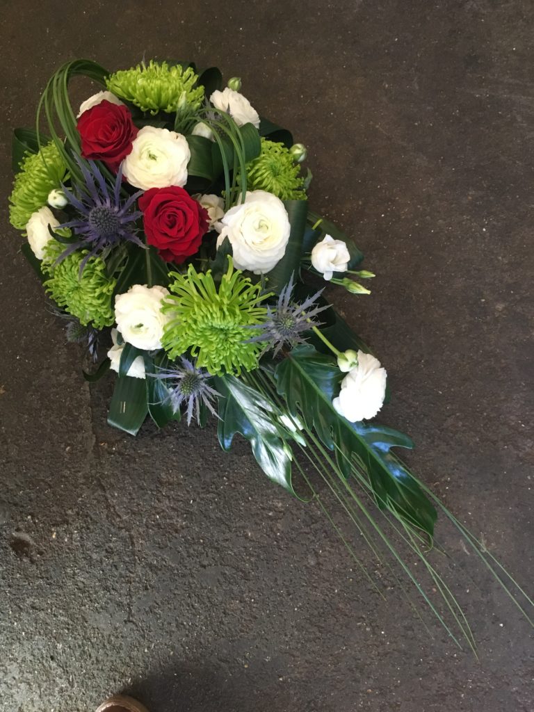 A display of funeral Flowers Cheltenham from Make Their Day Florist.
